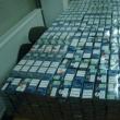 Potrivit anchetatorilor, fraţii Timiş au manevrat peste 260.000 de pachete de ţigări de contrabandă