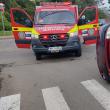Mașina răsturnată în urma impactului