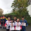 Antrenorul Radu Mihalescu alături de sportivii de la CSM Suceava medaliați la Naționale