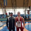 Antrenorul Andrei Bolohan alături de sportivul Alin Capră