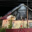 O femeie de 68 de ani, alarmată de vecini, în toiul nopții, că îi arde acoperișul casei