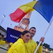 Soții Ionela și Marius Cozmiuc, în timpul defilării pe Sena